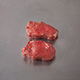 Grass Fed Eye Fillet steaks on stainless steel butcher's bench