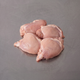 Free Range Chicken Thigh Fillets ~500g on stainless steel butcher's bench