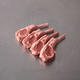 Grass Fed Lamb Cutlets ~500g on stainless steel butcher's bench